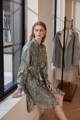Green printed silk dress with turn-down collar, long sleeves, tie belt, midi length