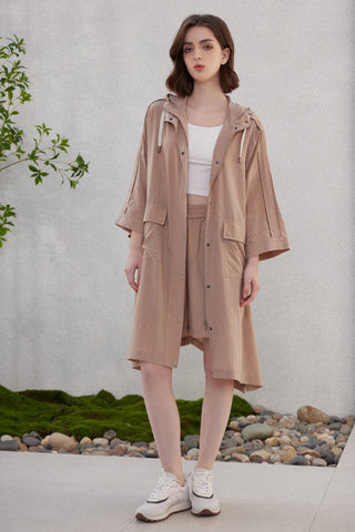Brown hooded longline lightweight jacket with layered front and flap pockets