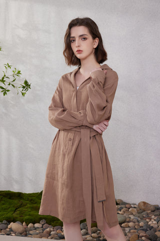 Close-up front of brown linen shirt-collar dress with button front and belt tie