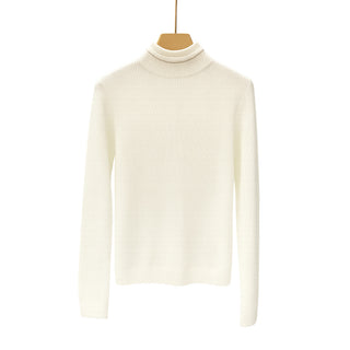 White cashmere sweater with ribbed turtleneck collar and long sleeves