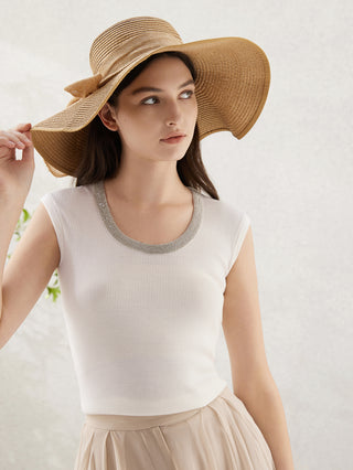 White tank top with sparkling beaded neckline and ribbed knit texture