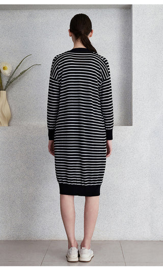 Black-and-white striped long cardigan, button-front, long sleeves, straight hem.
