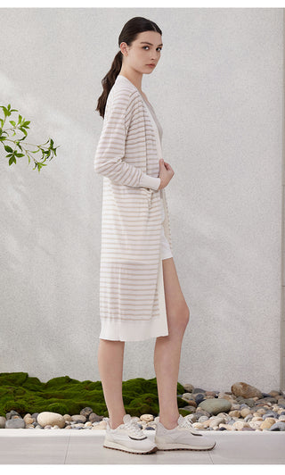 White long striped cardigan with long sleeves and front pockets, tan/blue stripes