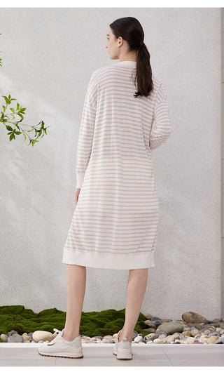 Back view of long striped cardigan, white with tan and blue horizontal stripes