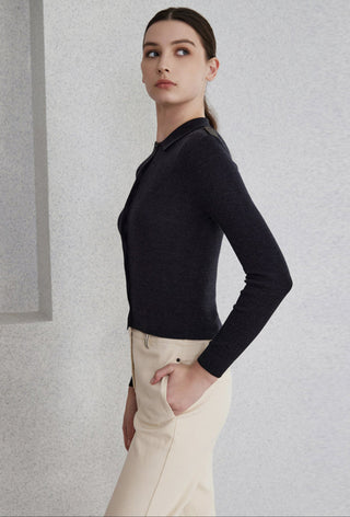 Black silk-wool knit polo cardigan, long sleeves, buttoned placket at neckline