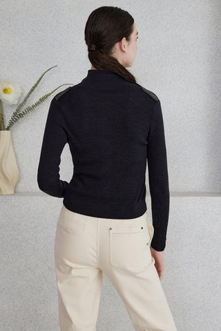 Black polo knit cardigan, back view with beaded shoulder accents