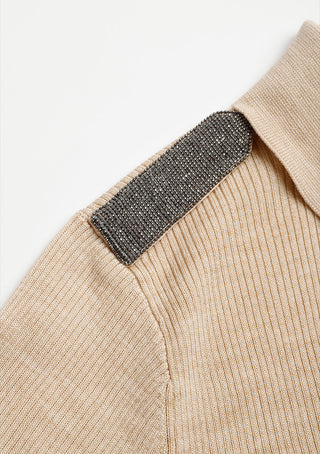 Beaded shoulder strap detail on beige knit polo cardigan