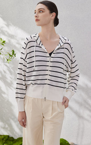 White zip-front knit hoodie cardigan with black horizontal stripes and ribbed cuffs
