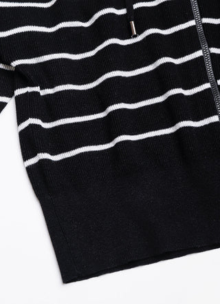 Black striped knit cardigan hem with ribbed trim and visible side seam