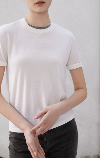 White sheer knit t-shirt with ribbed crew neck and layered beaded neckline detail