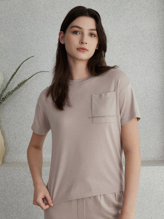 Wool-silk short-sleeve knit top in beige with crew neck and beaded pocket detail