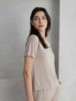 Beige short-sleeve wool-silk knit top, crew neck and side profile view