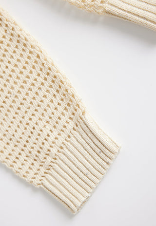 Light beige openwork cardigan cuff with ribbed trim and textured knit pattern