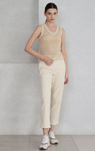 Camel sleeveless openwork knit tank with subtle sequins, front view with pants