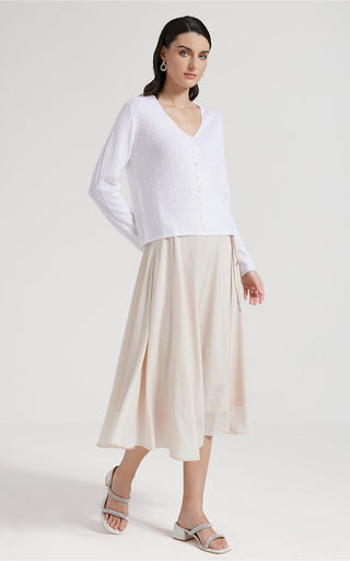 White open-neck single-breasted sweater, long sleeves, textured knit, button front