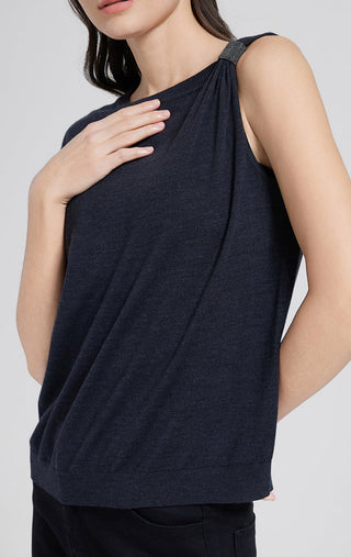 Dark gray short-sleeve top side view with gathered tie neckline detail