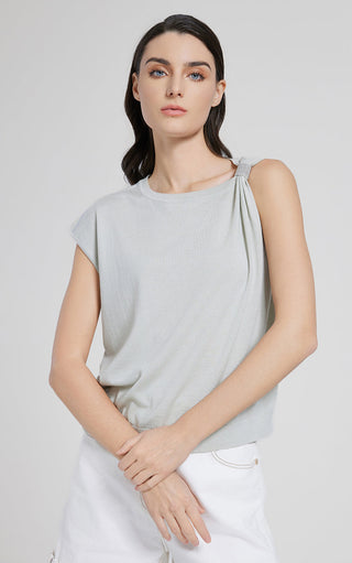 Sage green short-sleeve top with lace-up neckline detail