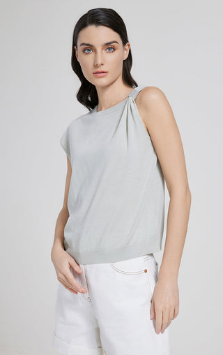 Sage green short-sleeve top with gathered lace-up neckline and relaxed fit
