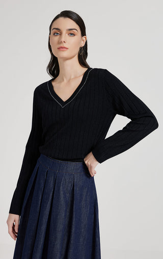 Black ribbed V-neck sweater with long sleeves and beaded trim detail