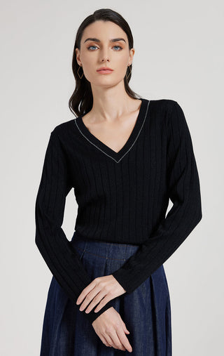 Black V-neck ribbed knit top with long sleeves, fine beaded trim along neckline