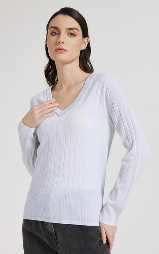 White ribbed V-neck knit top with long sleeves, fitted silhouette