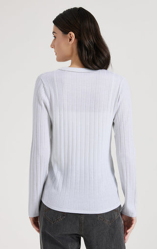 White ribbed knit top back view with long sleeves and V-neck