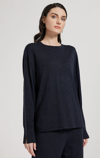 Dark gray knit top with beaded side seam, crew neck, long sleeves