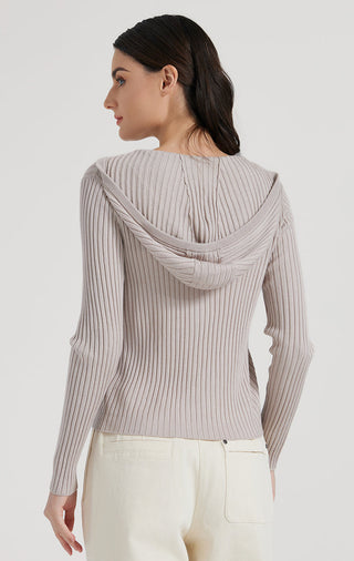 Camel zip knit cardigan from back with draped hood and ribbed long sleeves.
