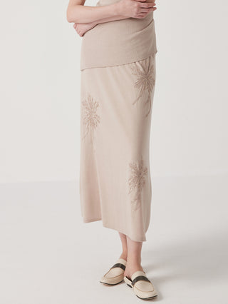 Beige midi skirt with ribbed waistband and scattered starburst embroidery