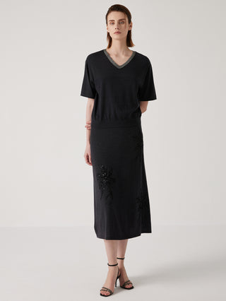 Black midi skirt with front floral embroidery, relaxed A-line fall