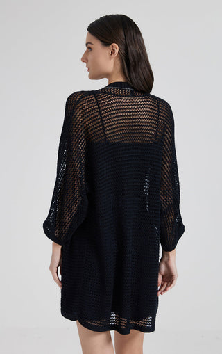 Black linen open-front crochet cardigan, back view with wide three-quarter sleeves