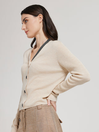 Beige wool-silk cardigan in side profile, V-neck trim, long sleeves, button front