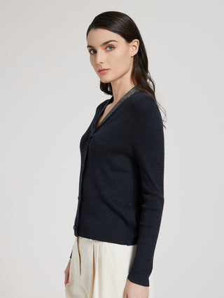 Graphite gray cardigan sweater side view, dark V-neck trim and button front