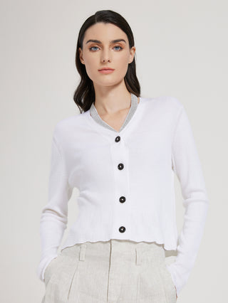 White wool-silk cardigan sweater with black buttons and V-neck trim, long sleeves