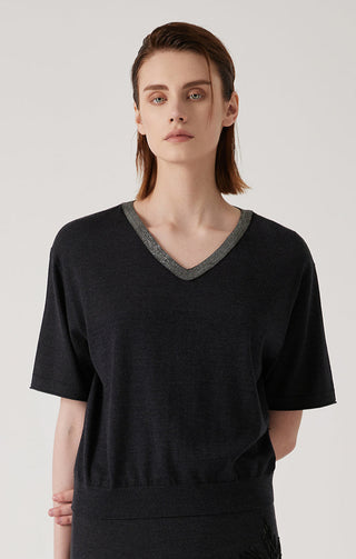 Black wool-silk knit V-neck top with gray binding and short sleeves