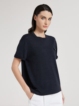 Black short-sleeve knit T-shirt with chest beaded ring detail; slightly draped fit