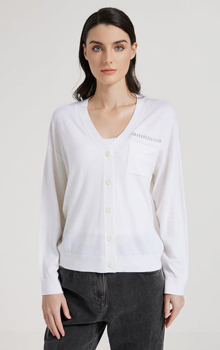 White ribbed knit cardigan with long sleeves, button front, chest pocket