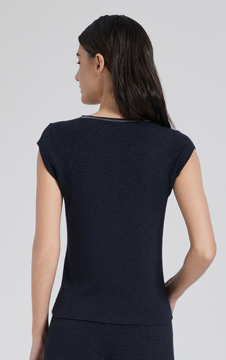 Back view of graphite gray ribbed knit top with short sleeves and curved hem