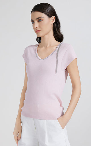 Pink ribbed knit top with V-neck and beaded tassel, fitted short sleeves