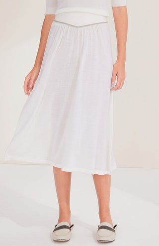 White wool midi skirt with beaded chain trim waistband, gathered for a soft A-line fit