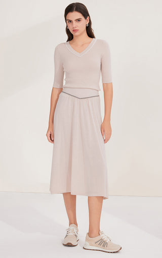 Light wool midi skirt with gathered waist and beaded chain trim, knee-length A-line