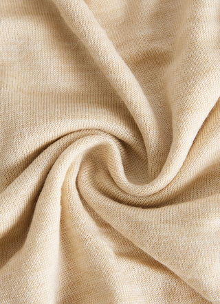 Camel wool-silk knit fabric close-up with soft drape texture