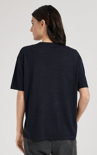 Dark back view of short-sleeve crewneck top with subtle silver thread trim