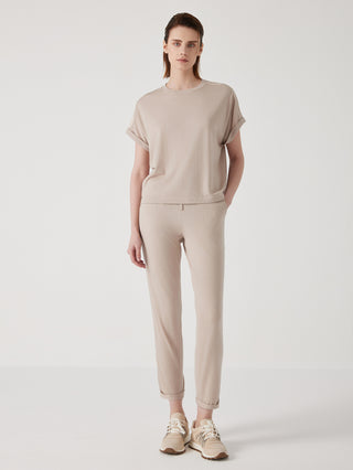 Camel knit top with crew neck and straight hem, worn with matching pants