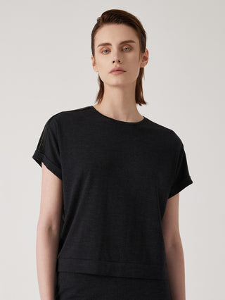 Black wool-silk knit top with crew neck and short sleeves