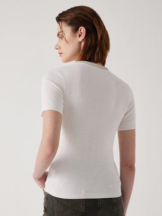 White wool-silk knit top, short sleeves and crew neck, back/side view