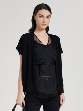 Black batwing sleeve top with V-neck, tie waist and patch pocket panel