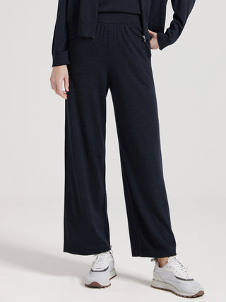 Dark gray wide-leg knit pants with elastic waist and front seam accent