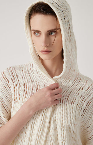 Cream/white hooded zip cardigan close-up with openwork knit and drawstring hood