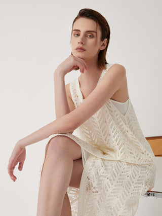 White openwork knit tank with scoop neckline and fine textured stitch pattern